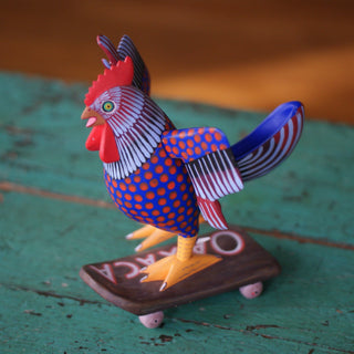 Carved and Painted Skateboard-Riding Roosters, Avelino Perez, La Unión Tejalápan Whimsical Zinnia Folk Arts Red on Blue Rooster/"Oaxaca" on Skateboard  
