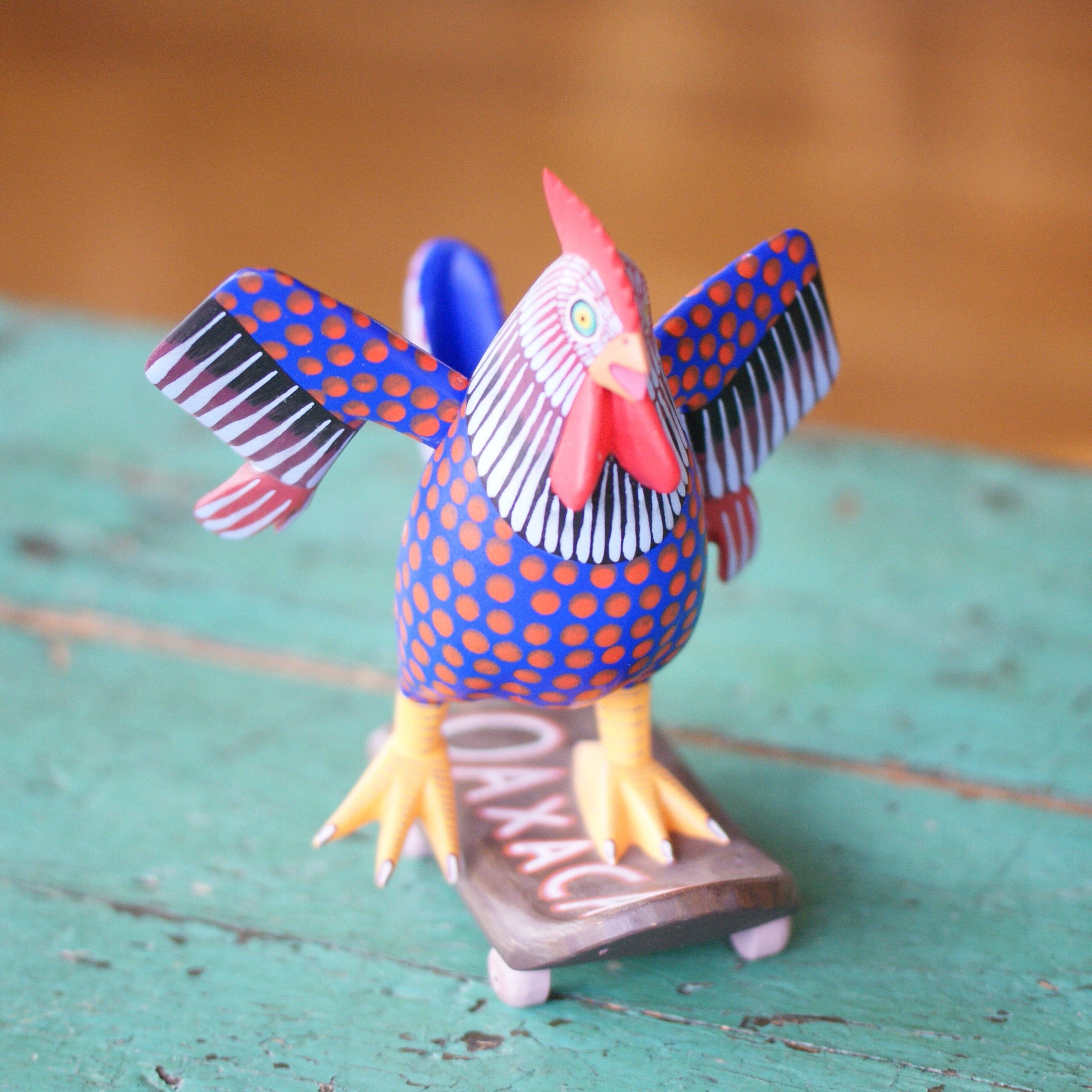 Carved and Painted Skateboard-Riding Roosters, Avelino Perez, La Unión Tejalápan Whimsical Zinnia Folk Arts   