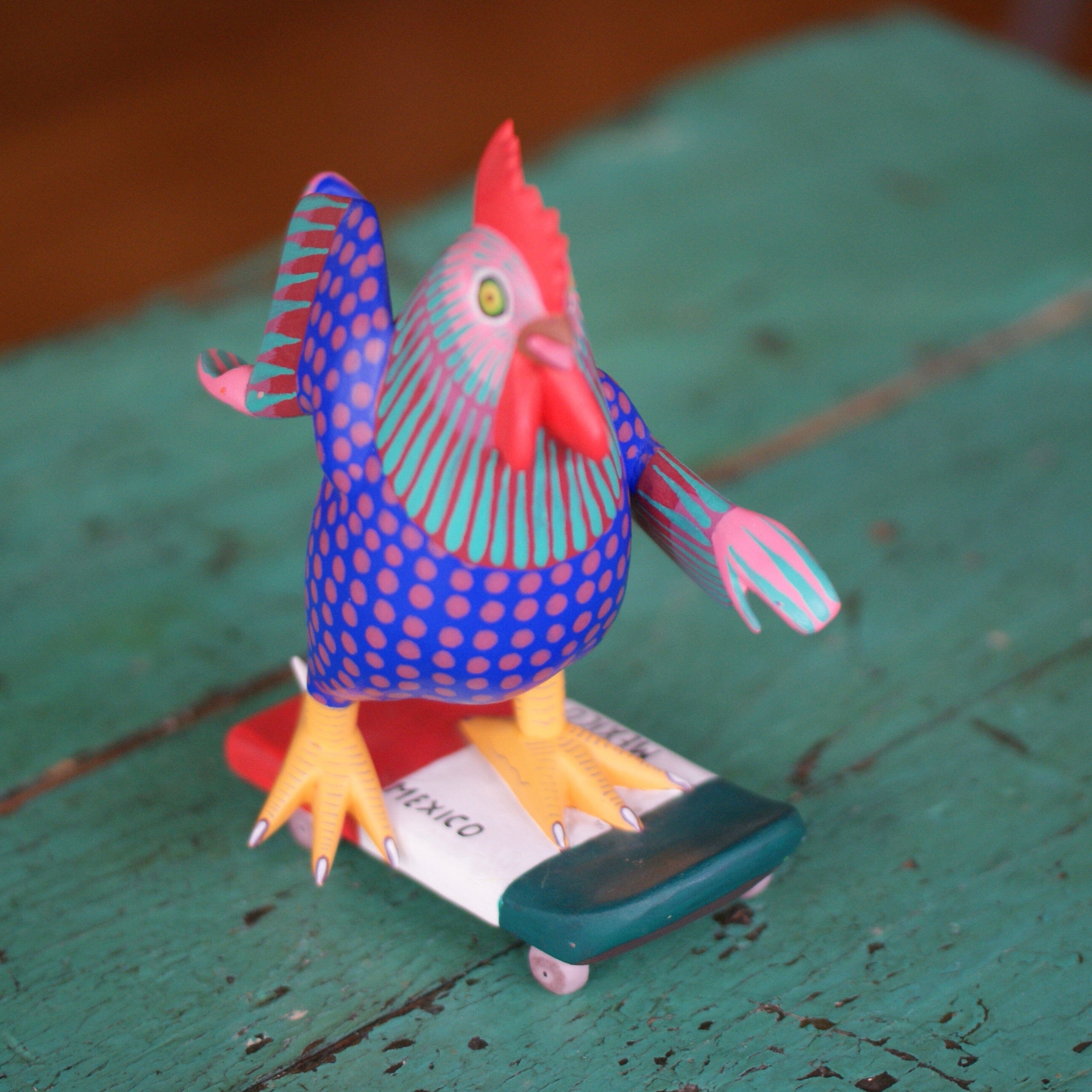 Carved and Painted Skateboard-Riding Roosters, Avelino Perez, La Unión Tejalápan Whimsical Zinnia Folk Arts   