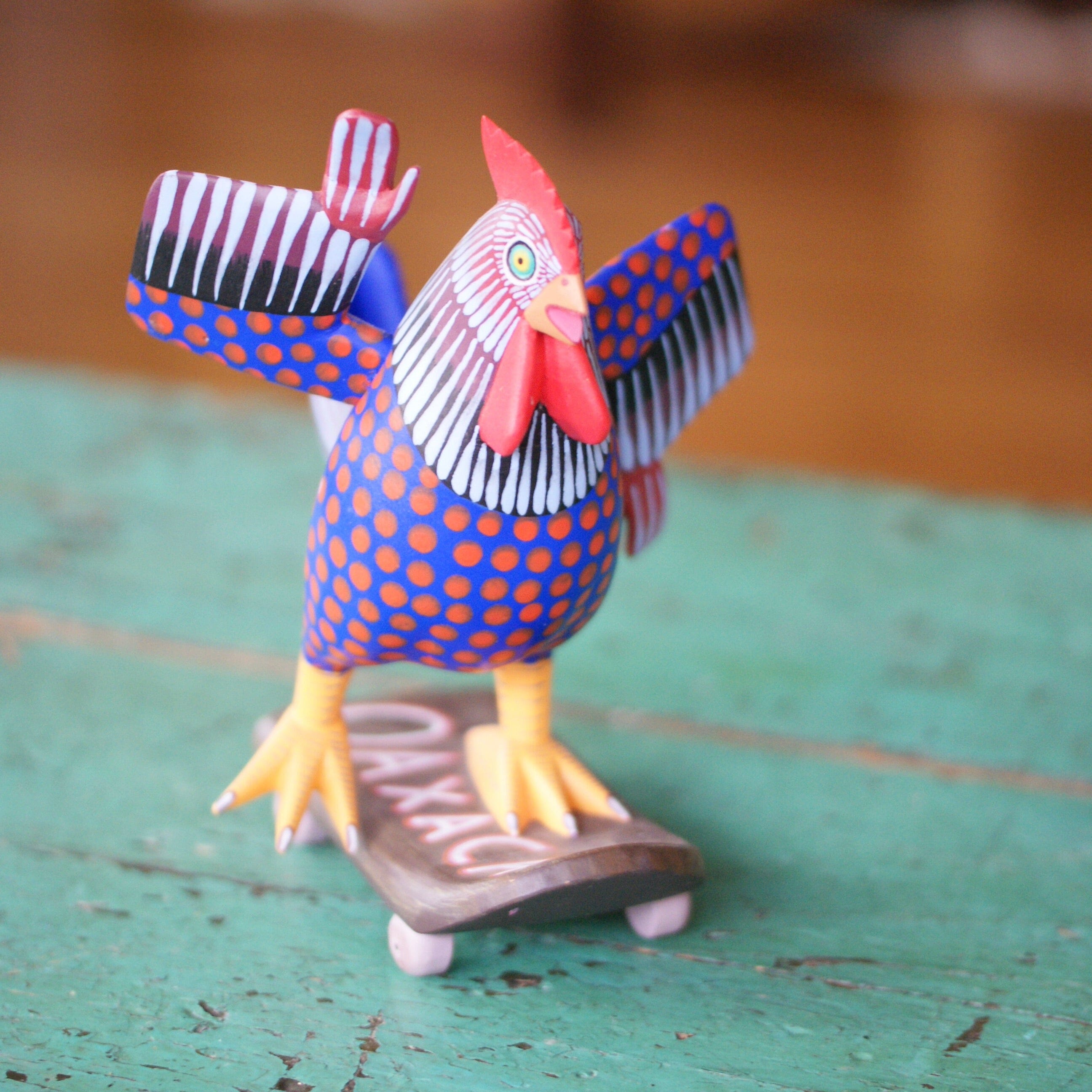 Carved and Painted Skateboard-Riding Roosters, Avelino Perez, La Unión Tejalápan Whimsical Zinnia Folk Arts   