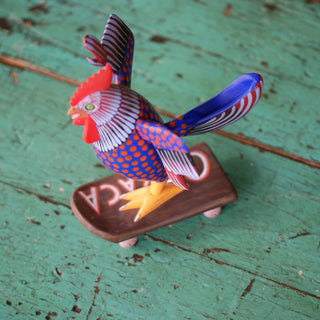 Carved and Painted Skateboard-Riding Roosters, Avelino Perez, La Unión Tejalápan Whimsical Zinnia Folk Arts   
