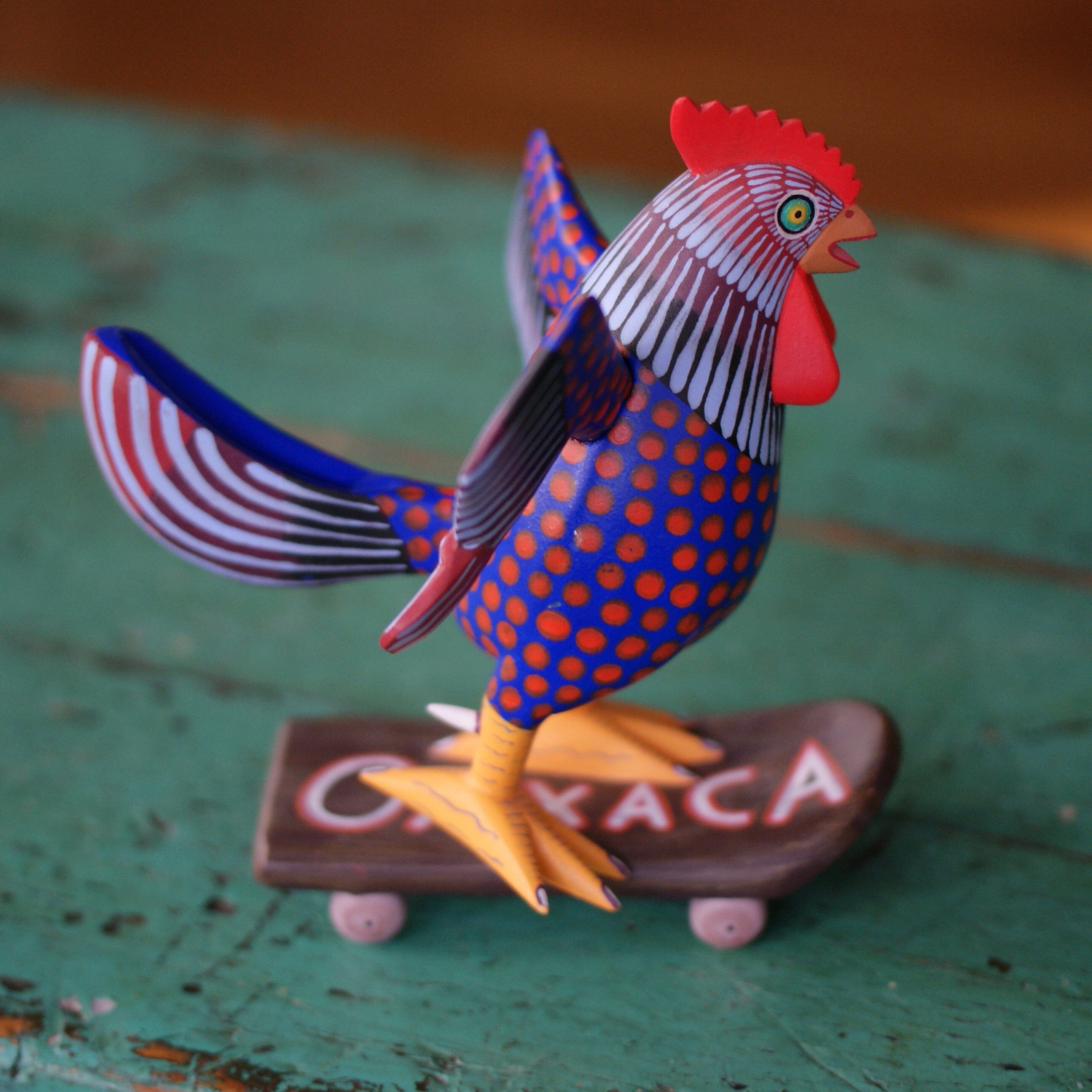 Carved and Painted Skateboard-Riding Roosters, Avelino Perez, La Unión Tejalápan Whimsical Zinnia Folk Arts   