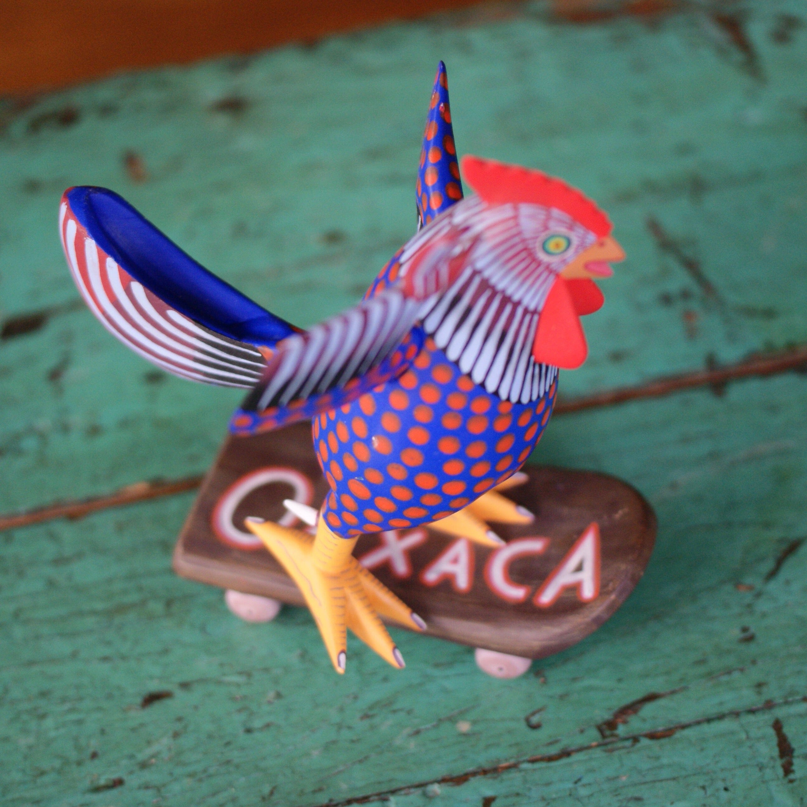 Carved and Painted Skateboard-Riding Roosters, Avelino Perez, La Unión Tejalápan Whimsical Zinnia Folk Arts   