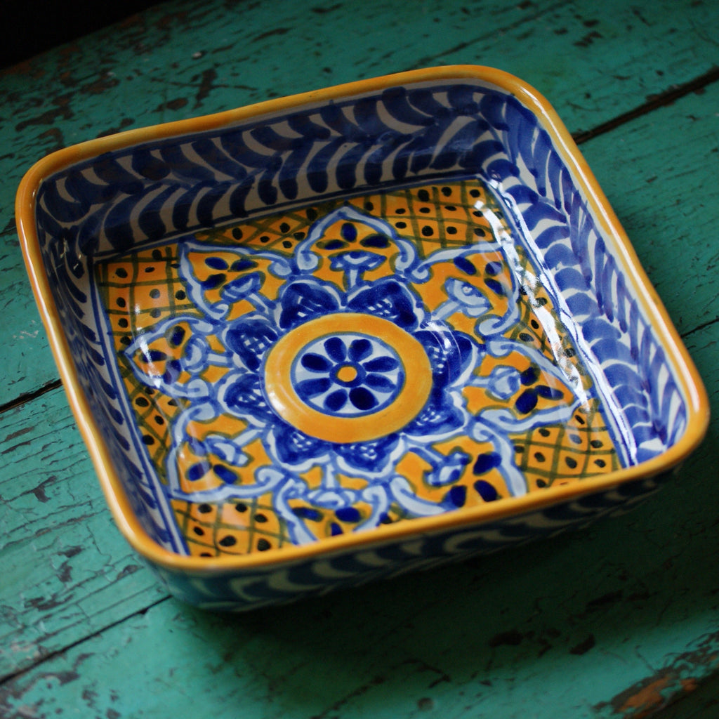 https://zinniafolkarts.com/cdn/shop/files/square-9x-9-talavera-baking-pan-various-designs-ready-to-ship-ceramics-zinnia-folk-arts-blue-and-saffron-510551_1024x1024.jpg?v=1700162807