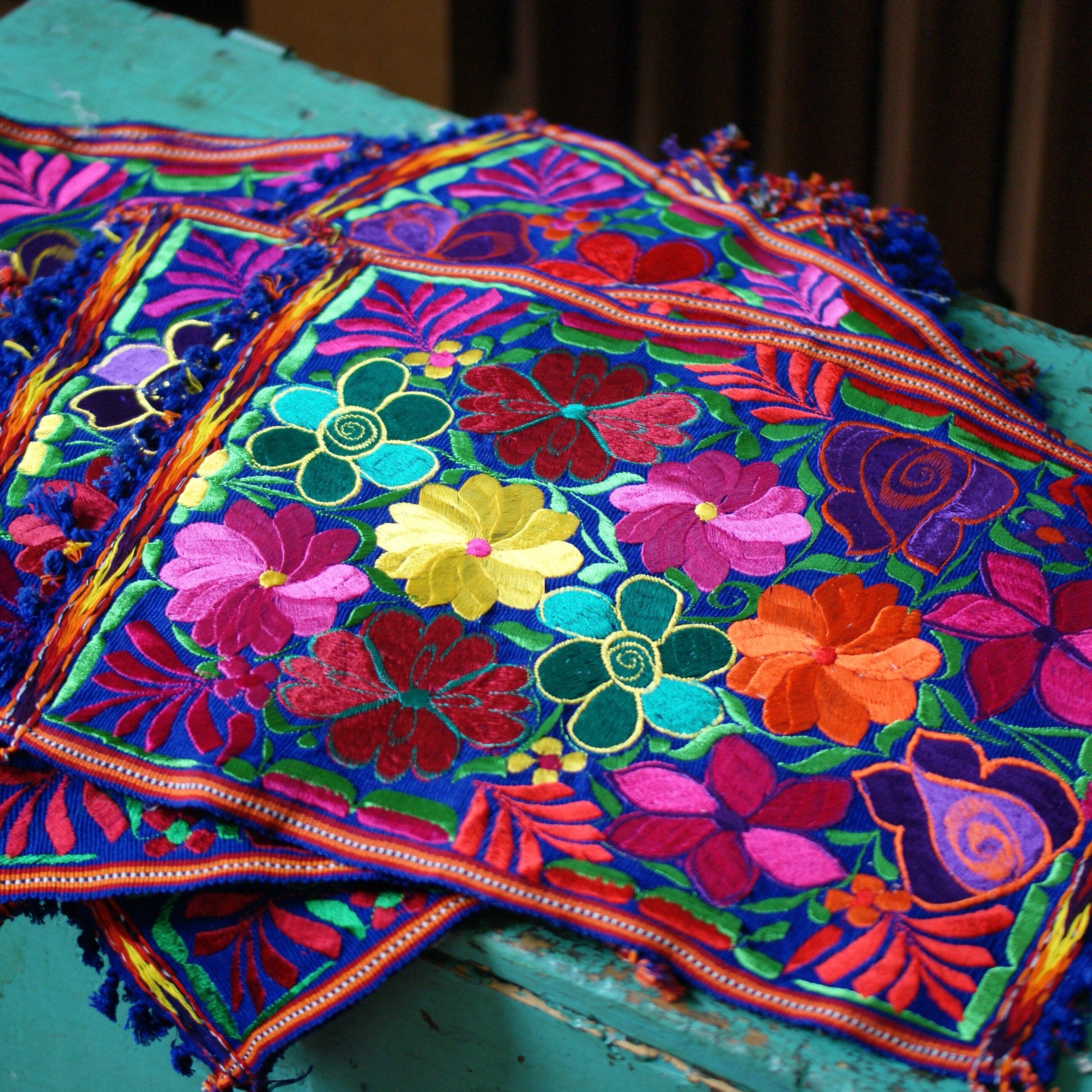 Vibrant Mexican Machine-Embroidered Placemats Textile Zinnia Folk Arts Multi-color on Dark Blue/orange edging